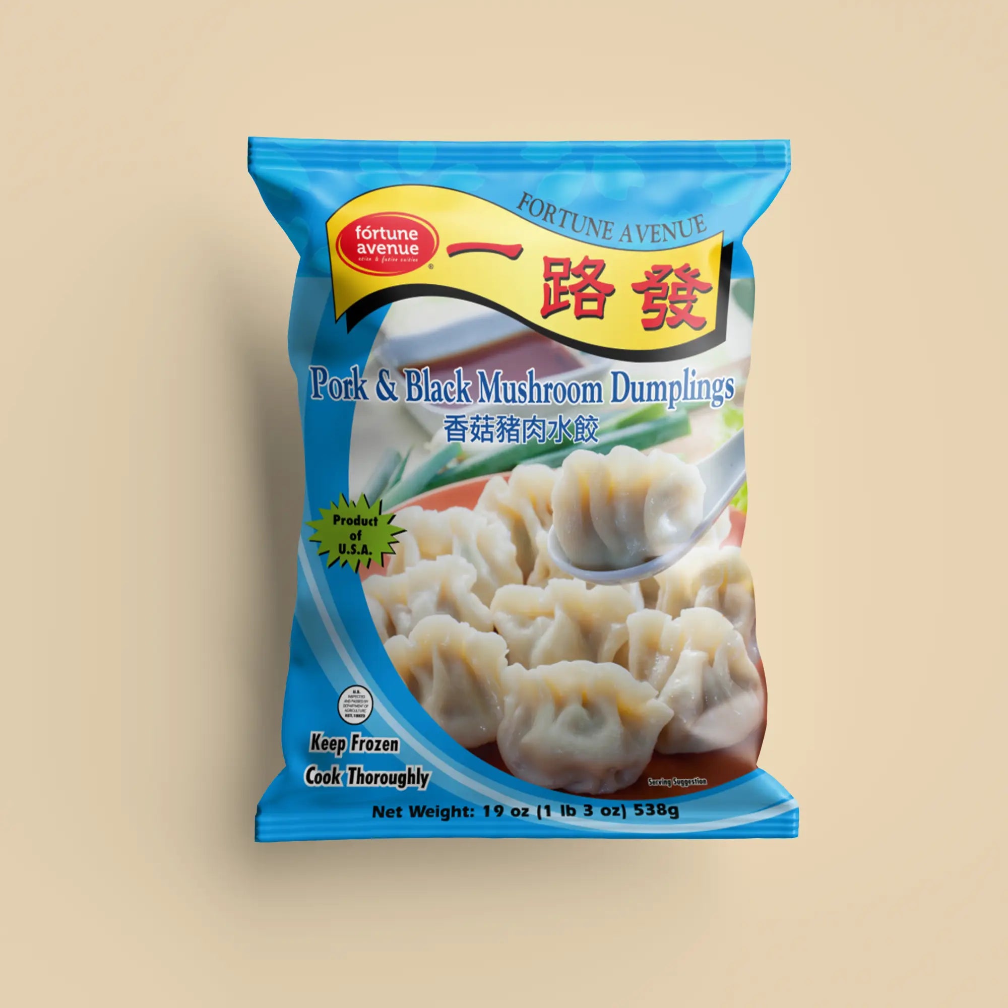 Packaging for Fortune Avenue Pork & Black Mushroom Dumplings, featuring a plate of dumplings with one lifted by a spoon, labeled in English and Chinese with a cyan design and product of U.S.A. badge.